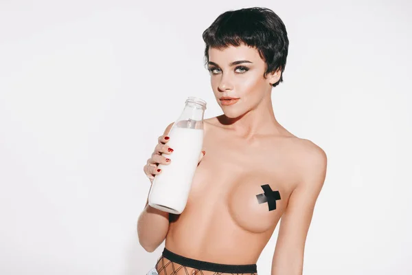 Sexy girl with milk — Stock Photo